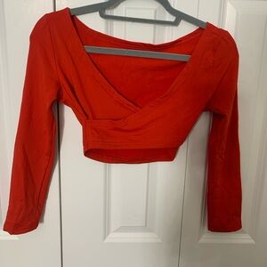 Red long sleeve crop top. Missing tags, either XS or S.